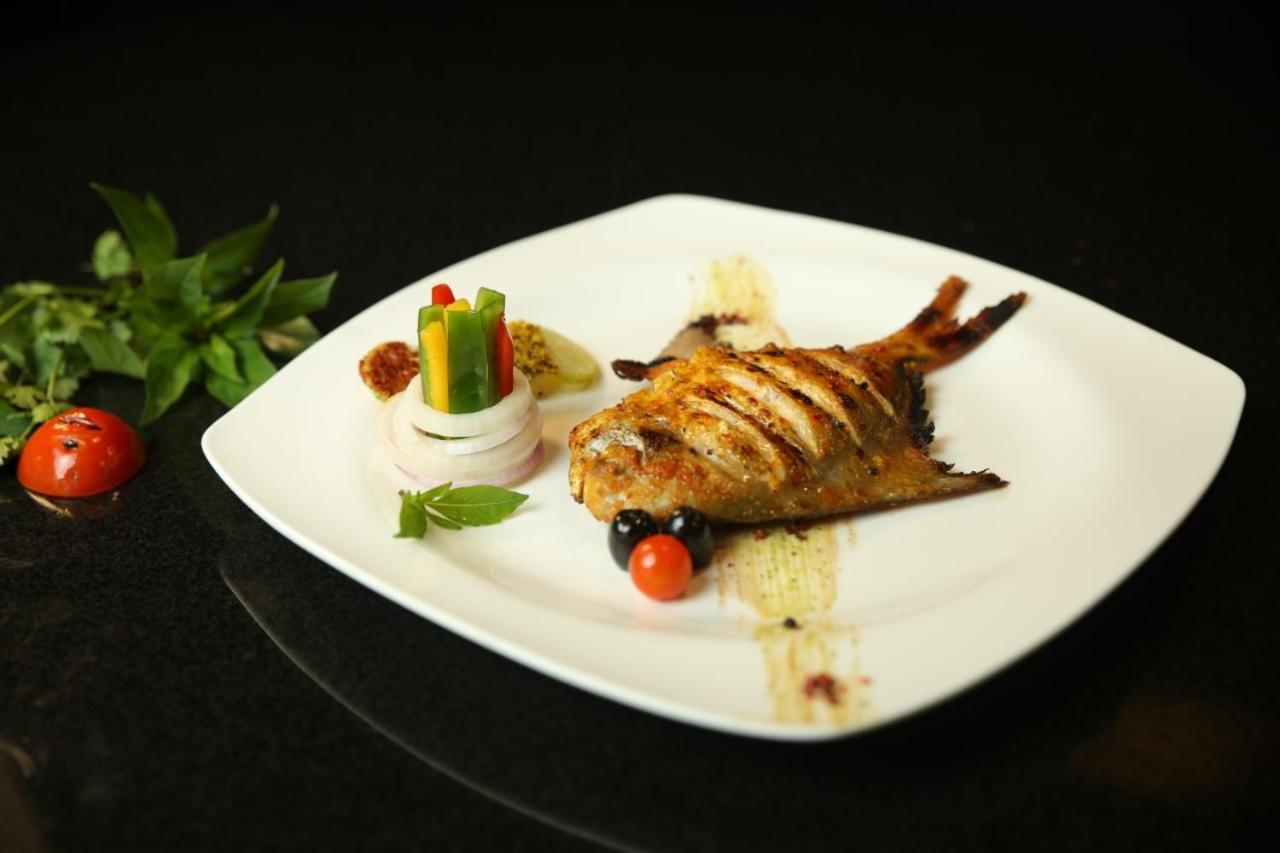 Park Lane Hotel Lahore Exterior photo A prepared John Dory