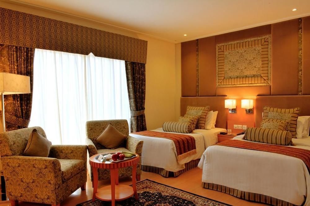 Park Lane Hotel Lahore Exterior photo A room at the hotel