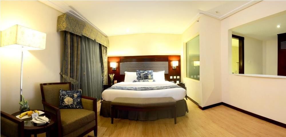 Park Lane Hotel Lahore Exterior photo Deluxe Room