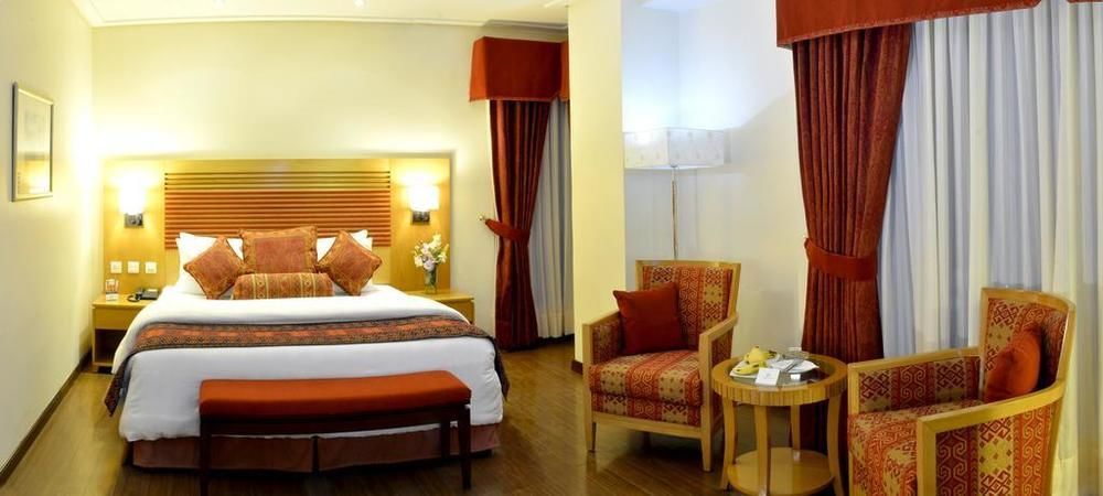 Park Lane Hotel Lahore Exterior photo A room at the hotel
