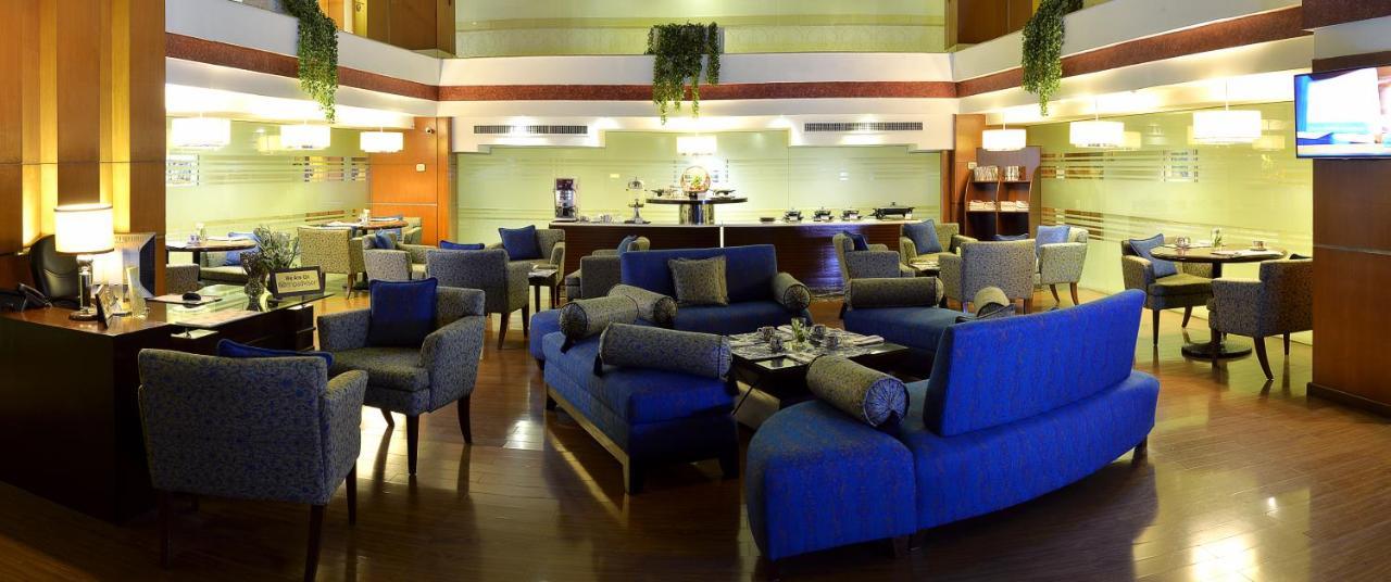 Park Lane Hotel Lahore Exterior photo The interior of the lounge