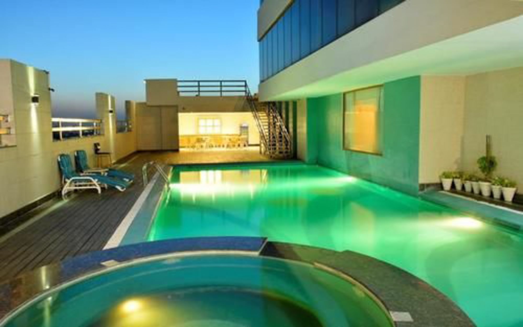 Park Lane Hotel Lahore Exterior photo The swimming pool at the hotel